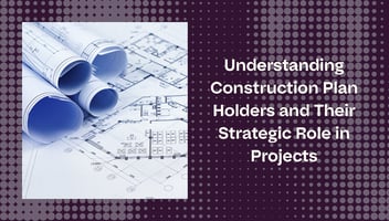 rolled blueprints and construction plans